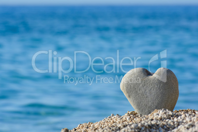 Heart shaped stone on a beach