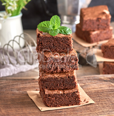 stack of square pieces of baked brownie