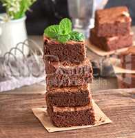 stack of square pieces of baked brownie