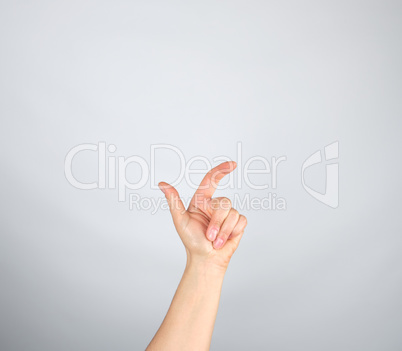 left hand with curled fingers