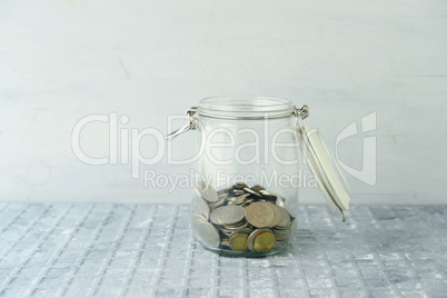 Saving jar with coins