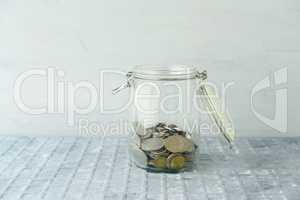 Saving jar with coins