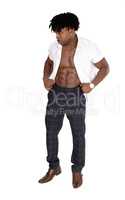 Black man standing in the studio with open shirt