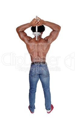 A black man working out with dumbbell over his head