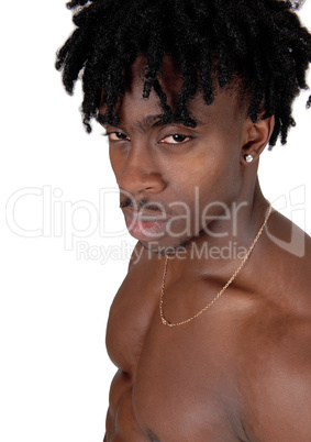 A close up portrait of a black man wihtout an shirt