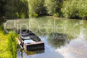 Small boat in marshes in Bourges