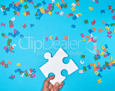 paper blank white puzzles on a blue background,  inscription tea