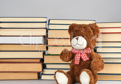 stack of various hardcover books