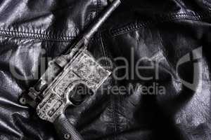 Old Pistol On Leather