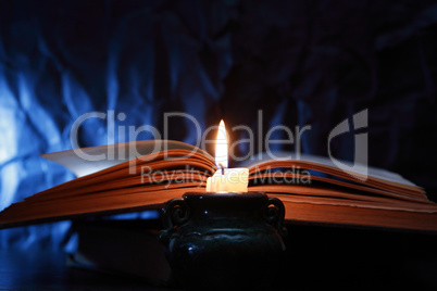 Candle Near Book