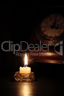 Candle Near Clock