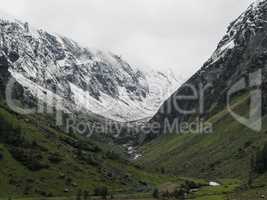 Snow capped mountains valley view