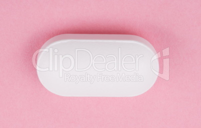 White Pill on Pink Background