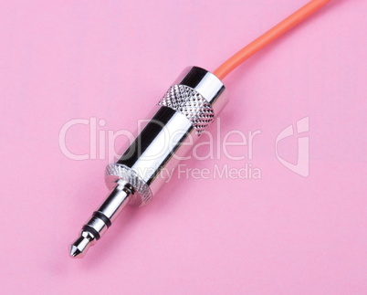 Stereo Male Plug Connector on Pink Background