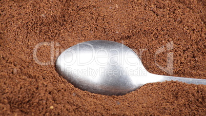 milled coffee  and teaspoon