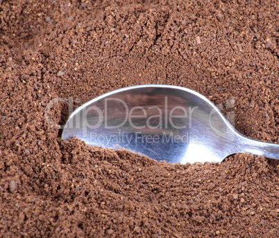 milled coffee  and teaspoon