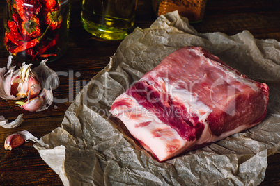 Raw pork loin on baking paper