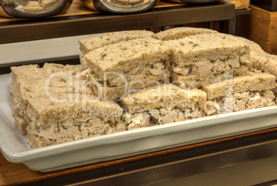 Chicken salad sandwich with the crust at a lunch buffet