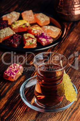 Tea in armudu glass with rahat lokum