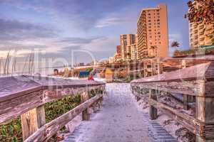 Boardwalk leading down to South Marco Island Beach at Sunset