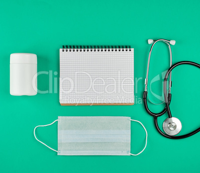 open notebook in line with white sheets