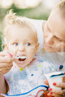 Feeding a baby girl