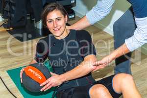 young woman work out with medicinal ball