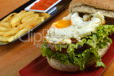 Burger with black pepper and French fries