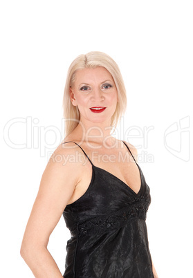 Beautiful woman standing in a black dress