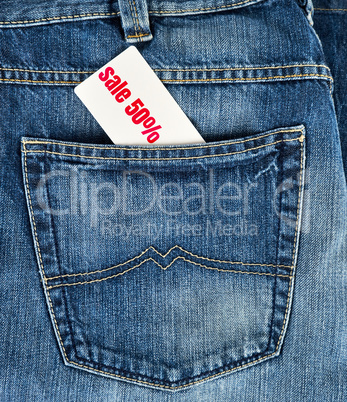back pocket of jeans and a white price tag with the inscription