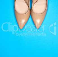 pair of beige women's shoes with a sharp toe