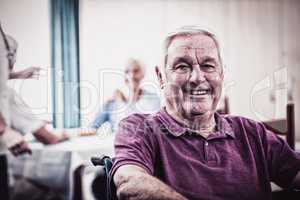 Portrait of a senior man in wheelchair