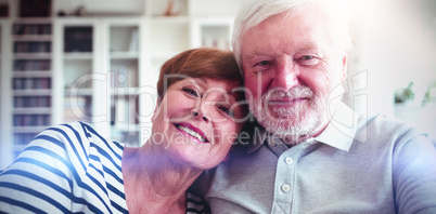 Senior couple sitting on sofa
