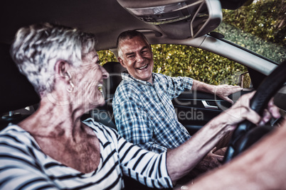 Senior couple sitting in car Senior couple sitting in car