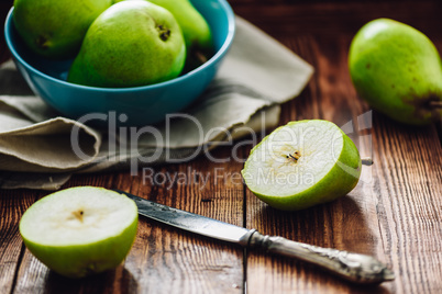 Sliced Pear with Knife.