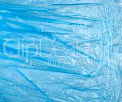 texture of crumpled blue polyethylene, full frame