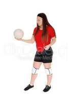 Pretty teenage girl playing her volley ball
