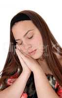 Sleeping young teenager on her hands