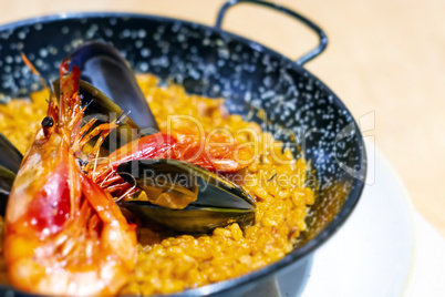 Paella with mariscos, a typical dish of traditional Spanish cuisine based on seafood and rice
