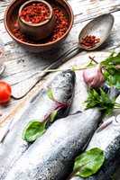 Fresh fish on wooden background