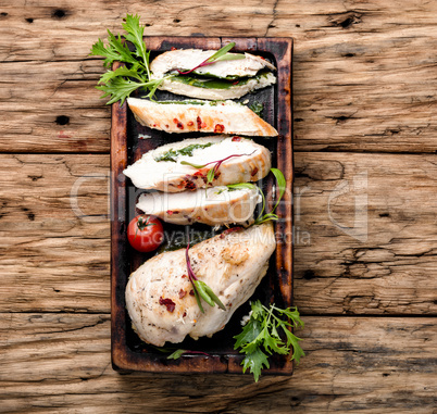 Sliced chicken breast with herb