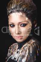 Portrait a girl with Golden icon painting makeup