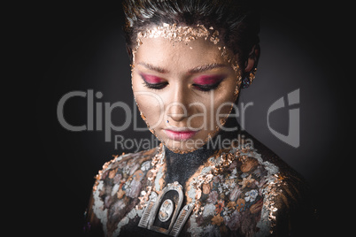 Portrait a girl with Golden icon painting makeup