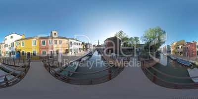360 VR Burano picturesque townscape with canal, church and colored houses, Italy