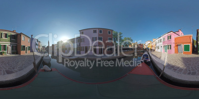 360 VR Burano island scene with traditional houses, canal and bell tower. Italy