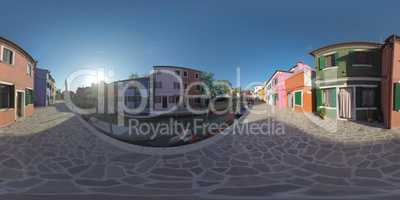 360 VR Traditional houses along canal and Leaning Bell Tower in Burano, Italy