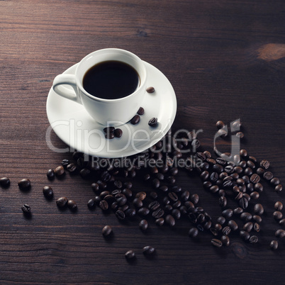 Coffee cup and beans