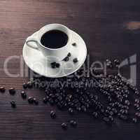 Coffee cup and beans