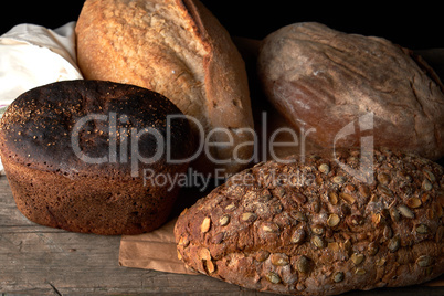 whole baked rye bread with pumpkin seeds and other types
