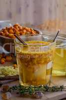 sea buckthorn honey ginger mix in glass with cinnamon